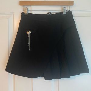 Black half pleated mini skirt